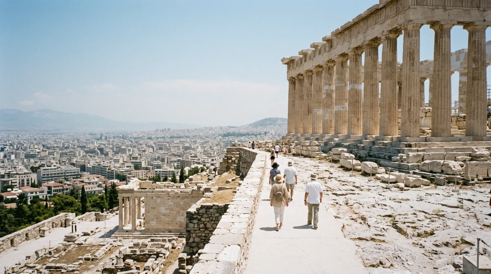 Unshaded marble on the Acropolis at midday in July with heat haze over the city, Athens in August, Greece