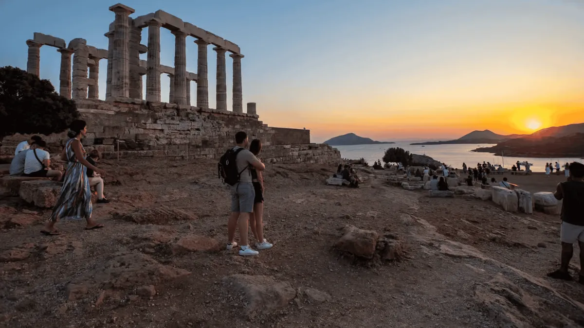 The columns of the Temple of Poseidon at Cape Sounion at sunset, on a trip from Athens, Greece