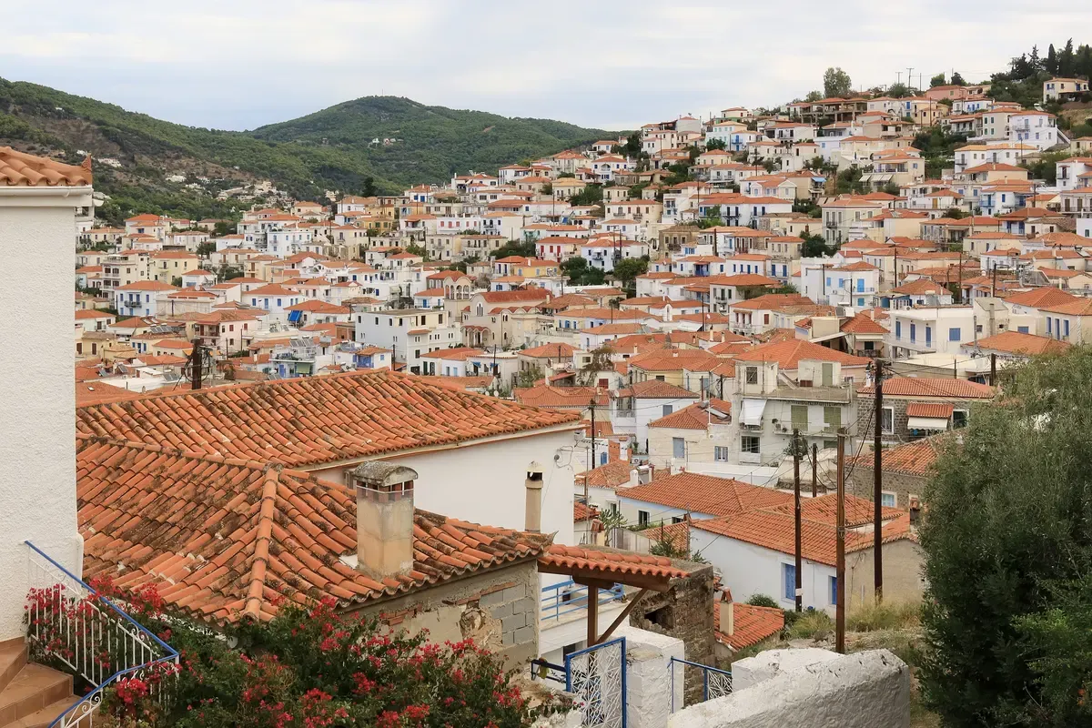 The 1927 clock tower above the town of Poros, a Saronic island day trip from Athens, Greece